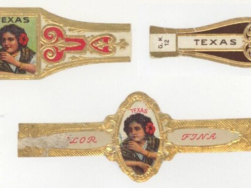 Ornate gold-embossed cigar bands from the 1920s