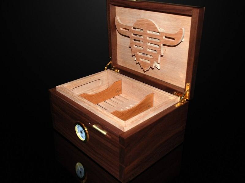 Open walnut desktop humidor with Spanish cedar interior and hygrometer