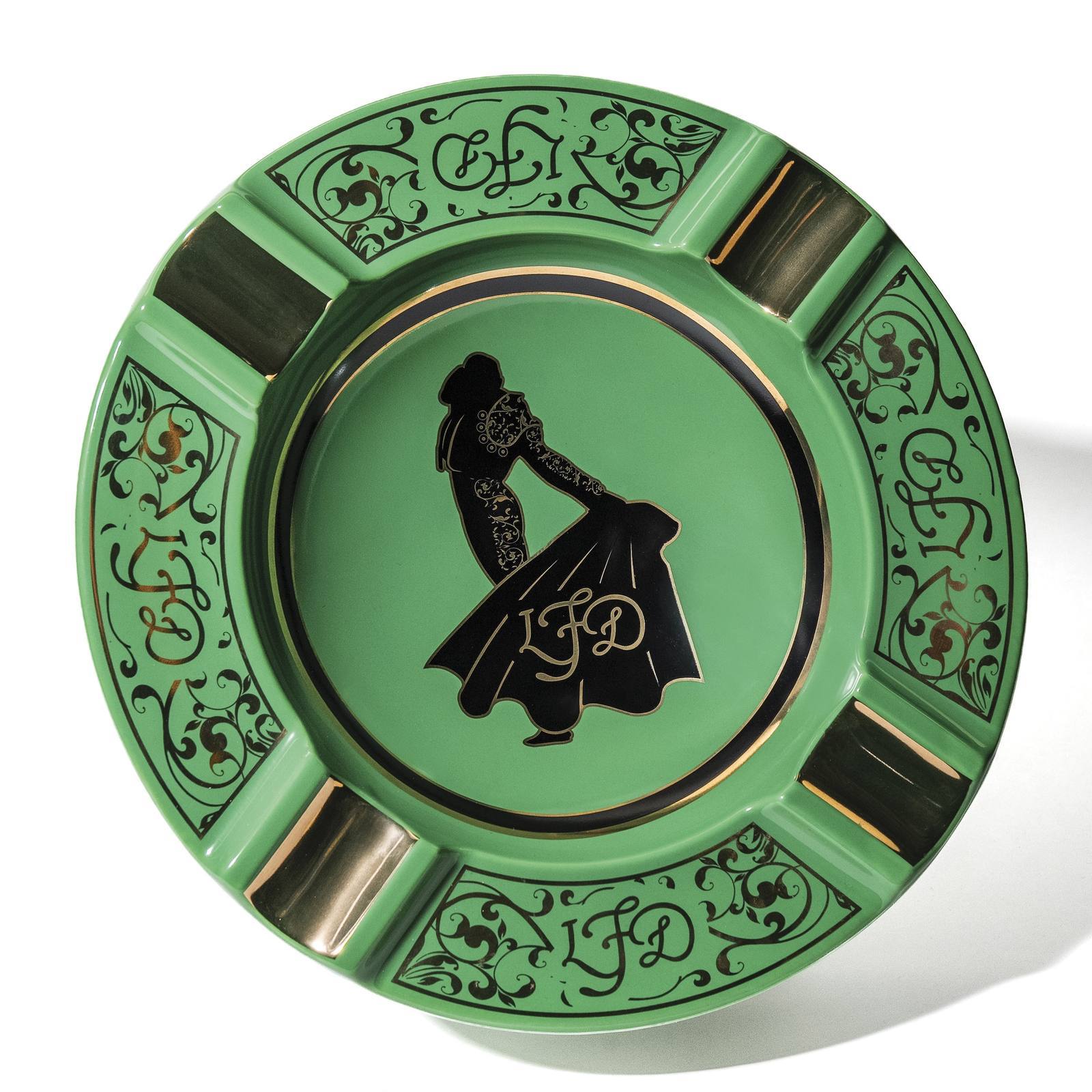 The circular green La Flor Dominicana Andalusian Bull ashtray with a matador design