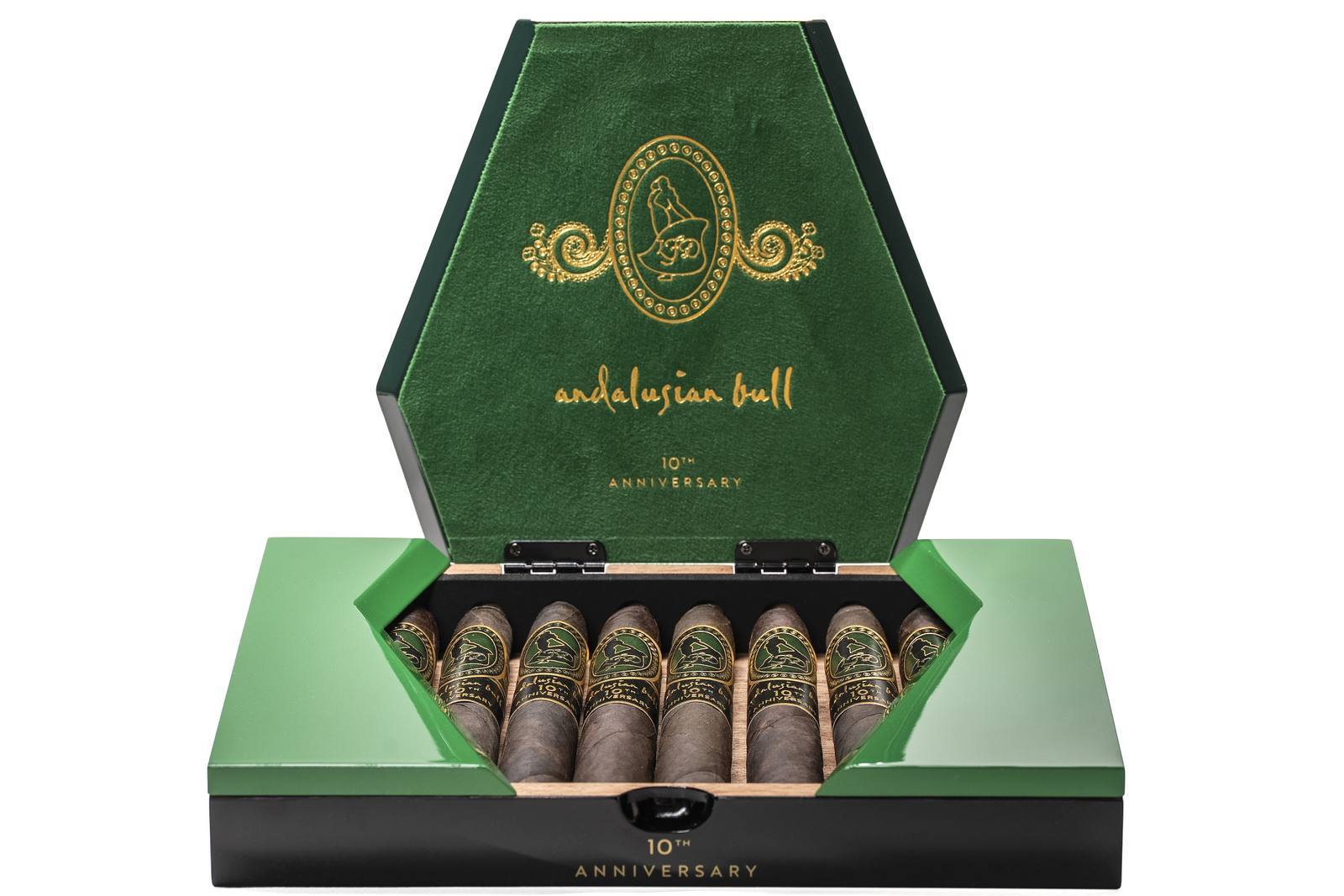 An open green and gold box of La Flor Dominicana Andalusian Bull 10th Anniversary Maduro cigars