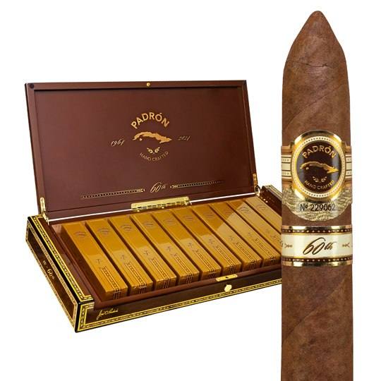 A Padron 60th Anniversary Perfecto cigar beside its open box of gold individual coffins, in Holt's product photography